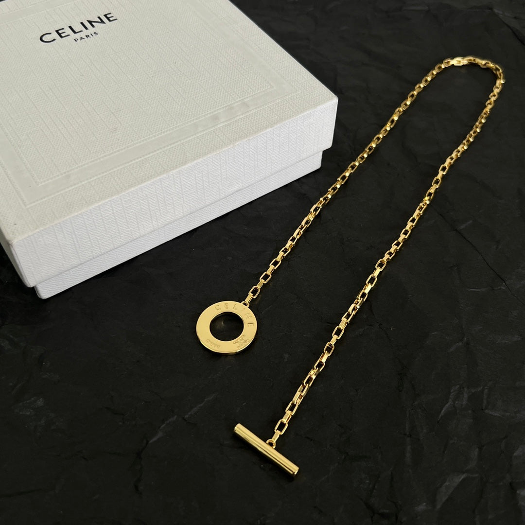 Martin Graham pendant necklace in polished metal-tone – side detail