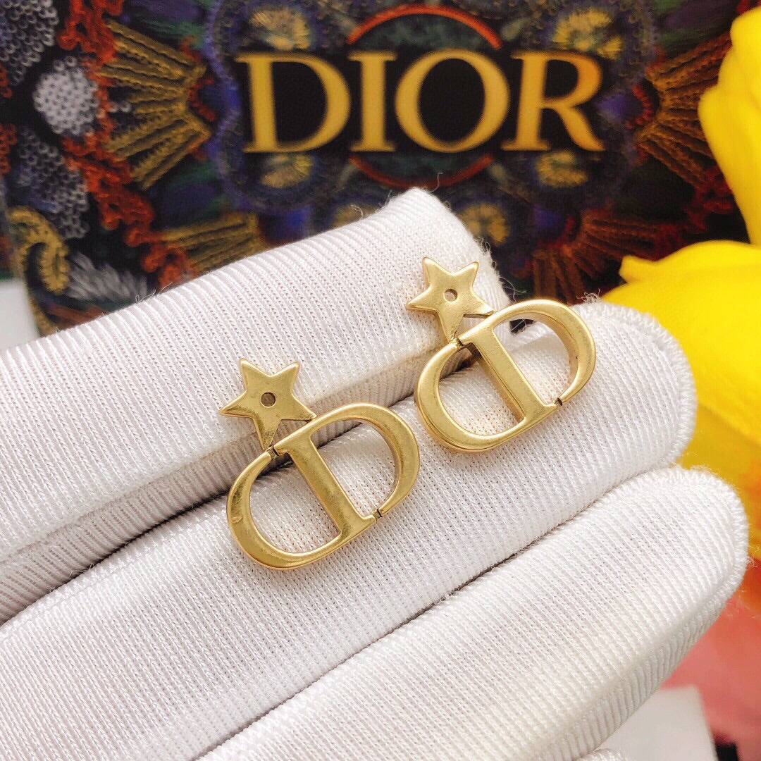 Martin Graham stud earrings in polished metal-tone – side detail