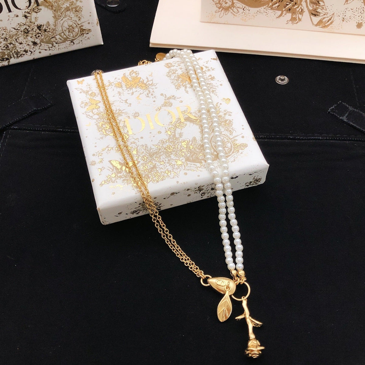 Martin Graham pendant necklace in polished metal-tone – side detail
