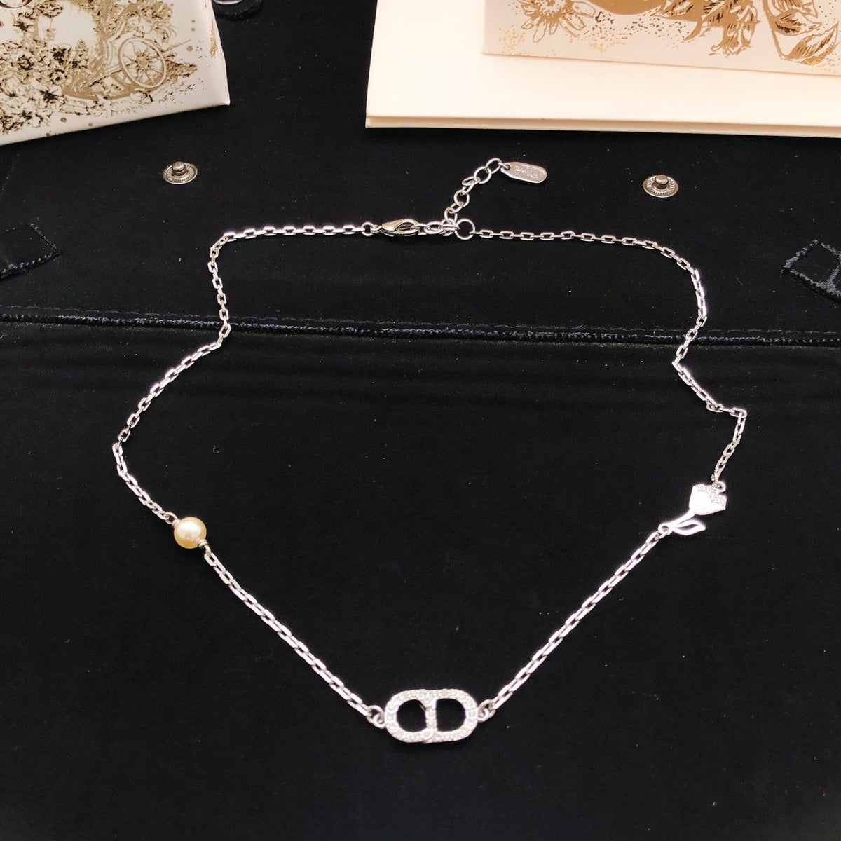 Martin Graham pendant necklace in polished metal-tone – side detail
