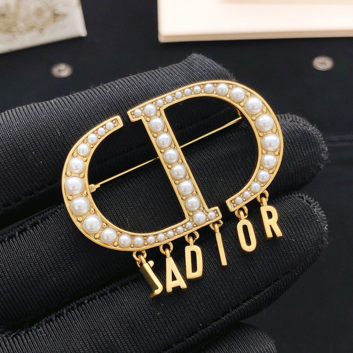 Martin Graham brooch in polished metal-tone