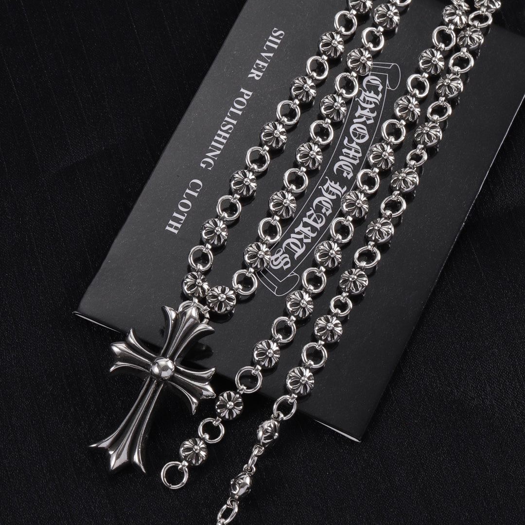 Martin Graham pendant necklace in polished metal-tone – close-up detail