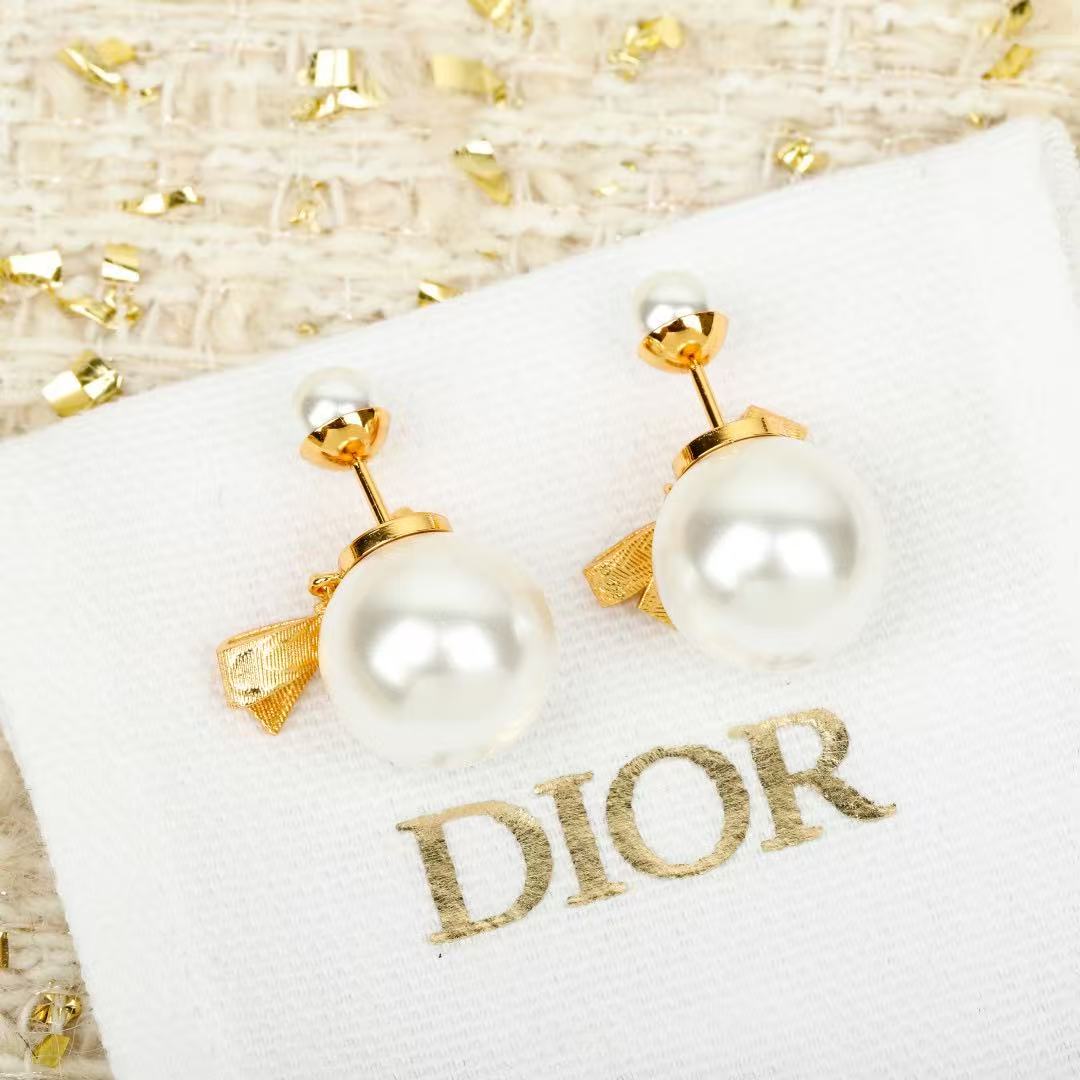 Martin Graham earrings in polished metal-tone