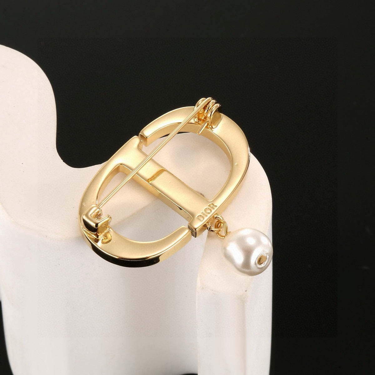 Martin Graham brooch in polished metal-tone
