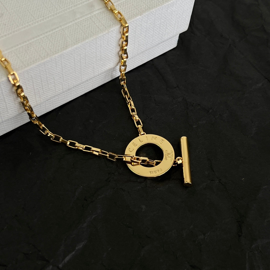 Martin Graham pendant necklace in polished metal-tone