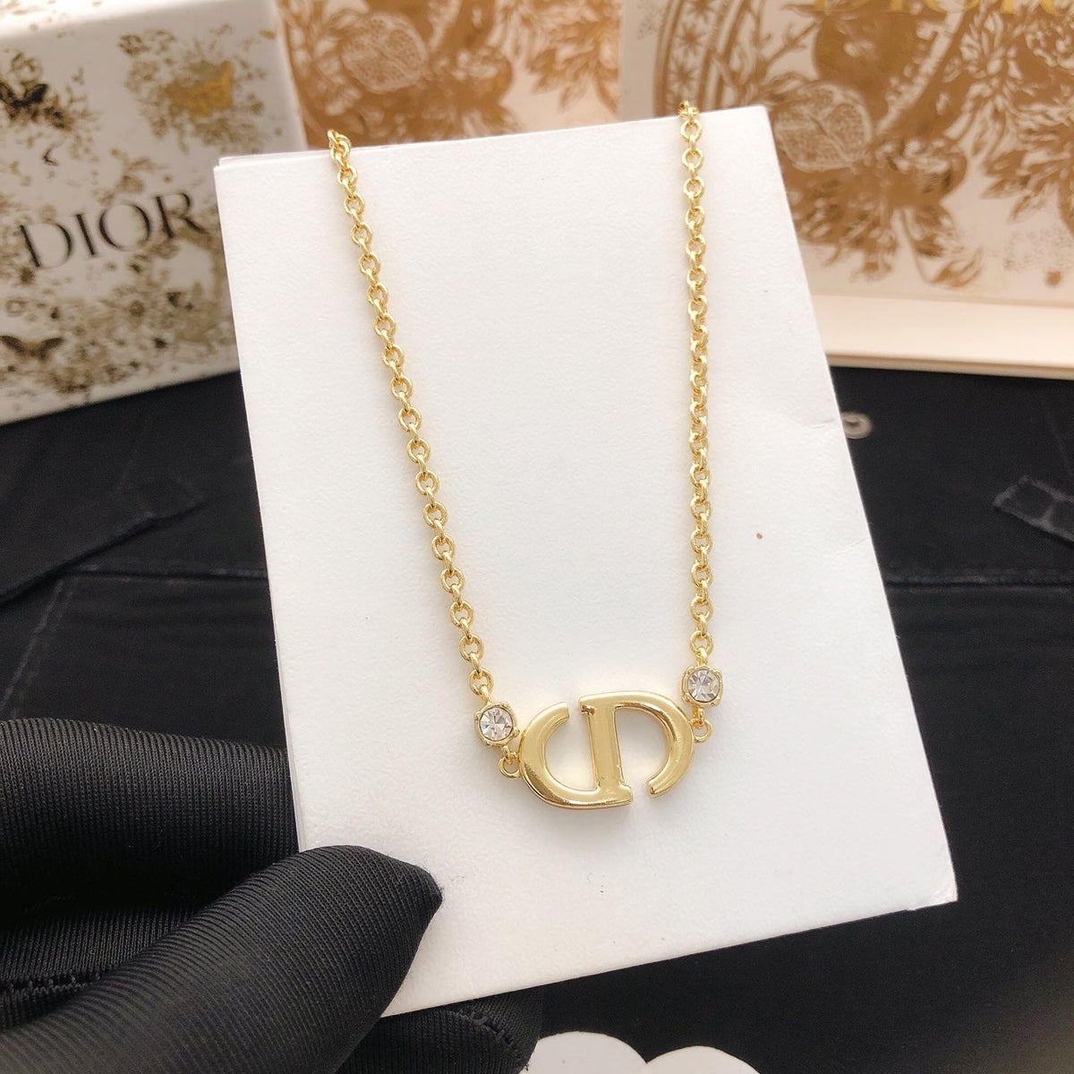 Martin Graham pendant necklace in polished metal-tone
