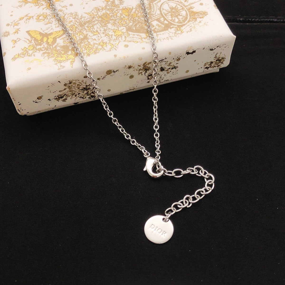 Martin Graham pendant necklace in polished metal-tone