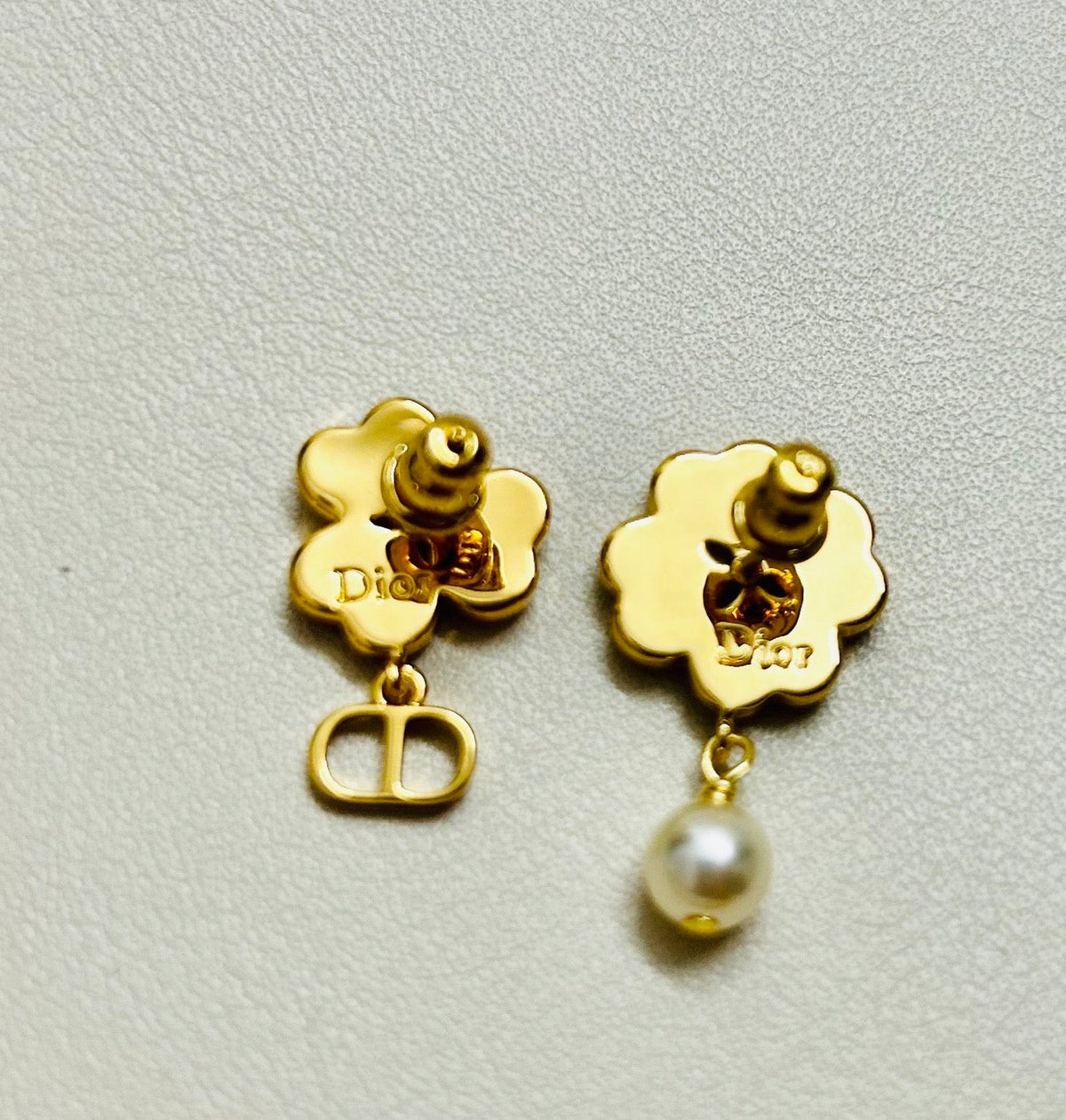 Martin Graham earrings in polished metal-tone