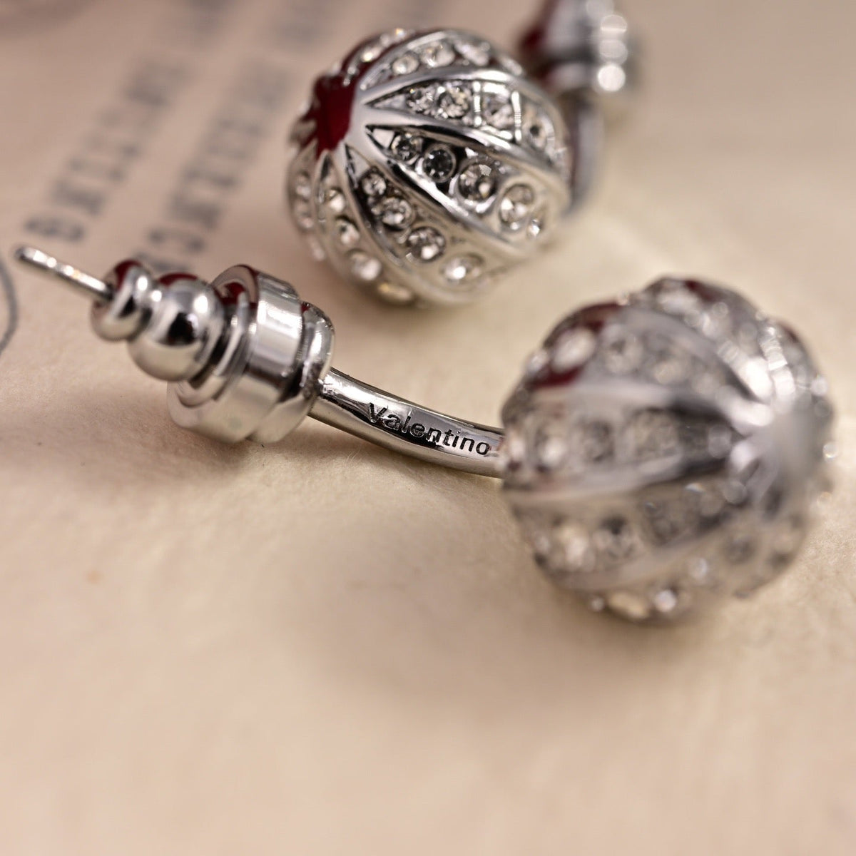 Martin Graham earrings in polished metal-tone
