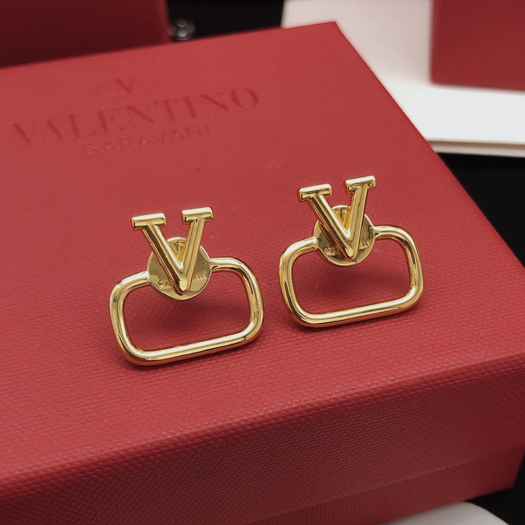 Martin Graham stud earrings in polished metal-tone