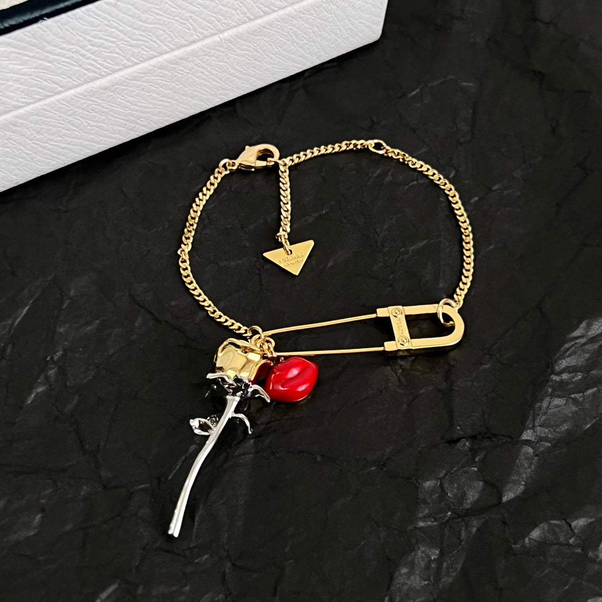 Martin Graham bracelet in polished metal-tone