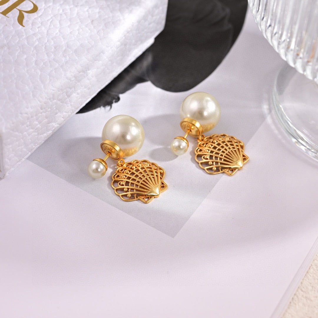 Martin Graham earrings in polished metal-tone