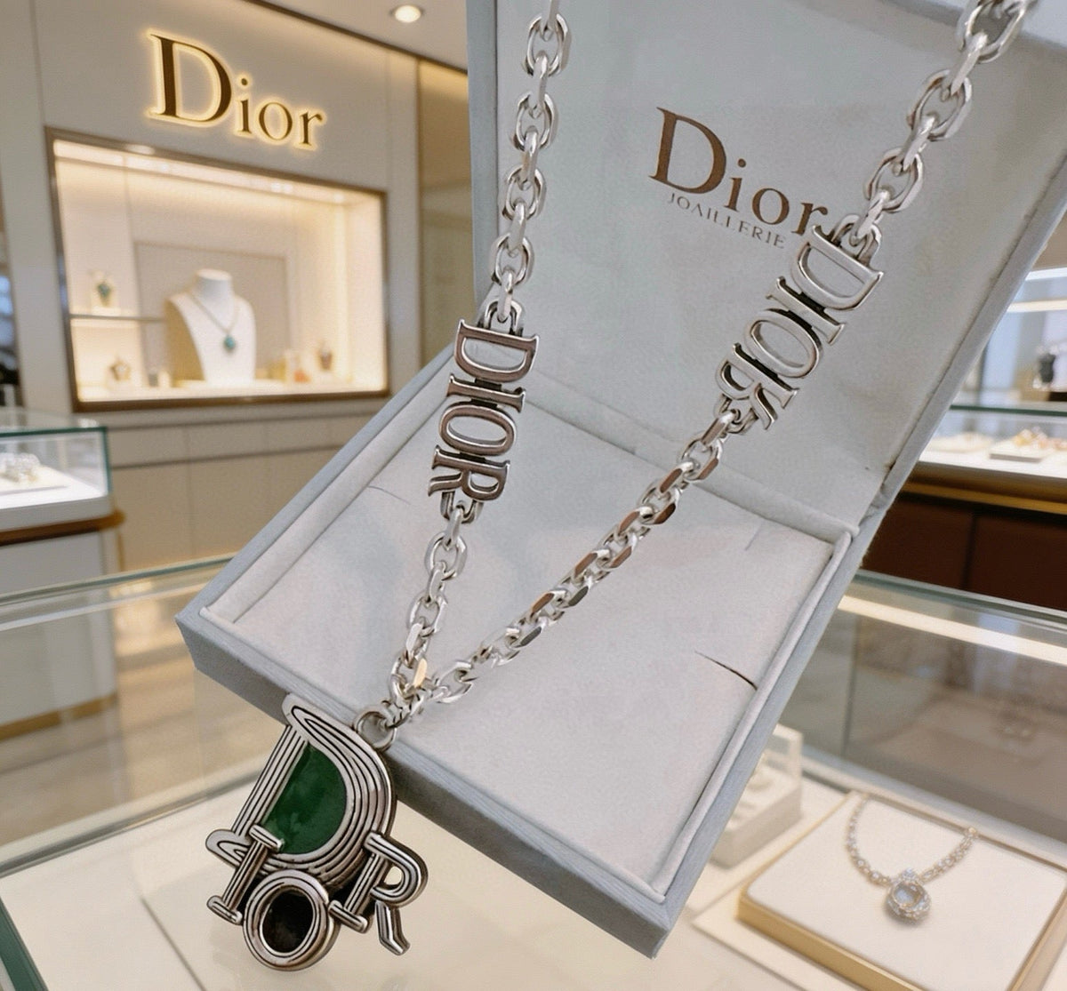 Martin Graham pendant necklace in polished metal-tone