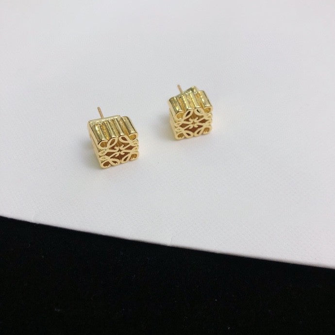 Martin Graham stud earrings in polished metal-tone