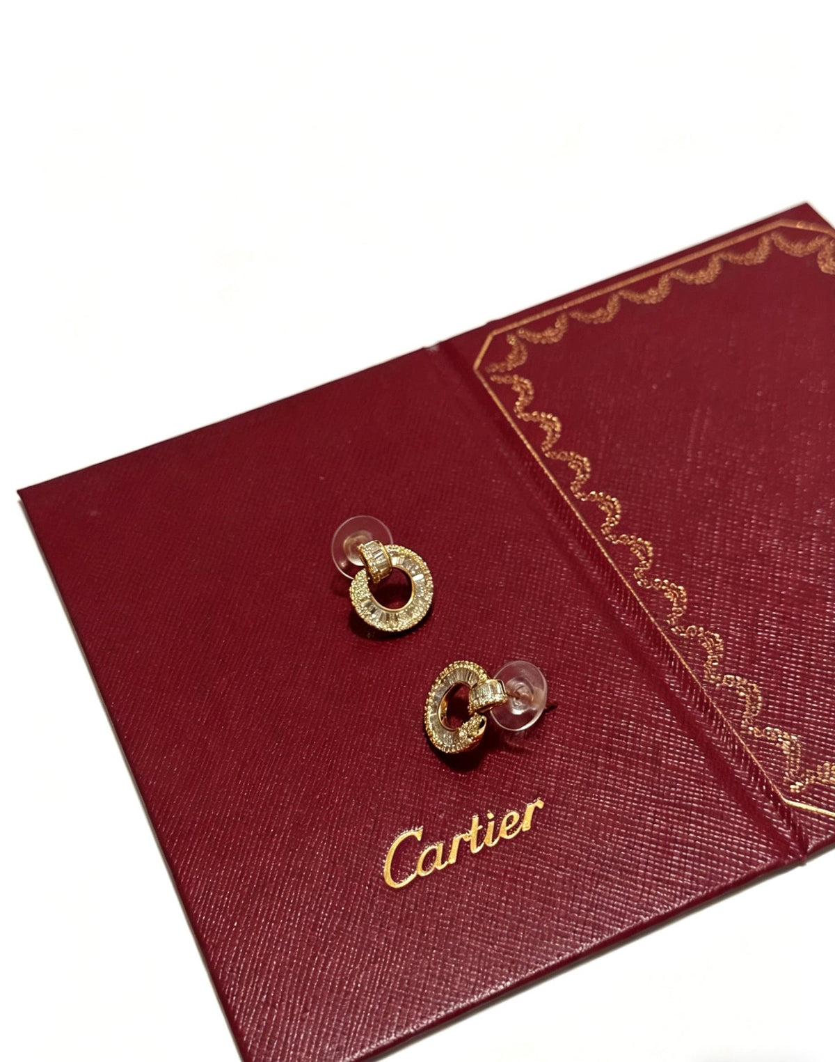 Martin Graham earrings in polished metal-tone
