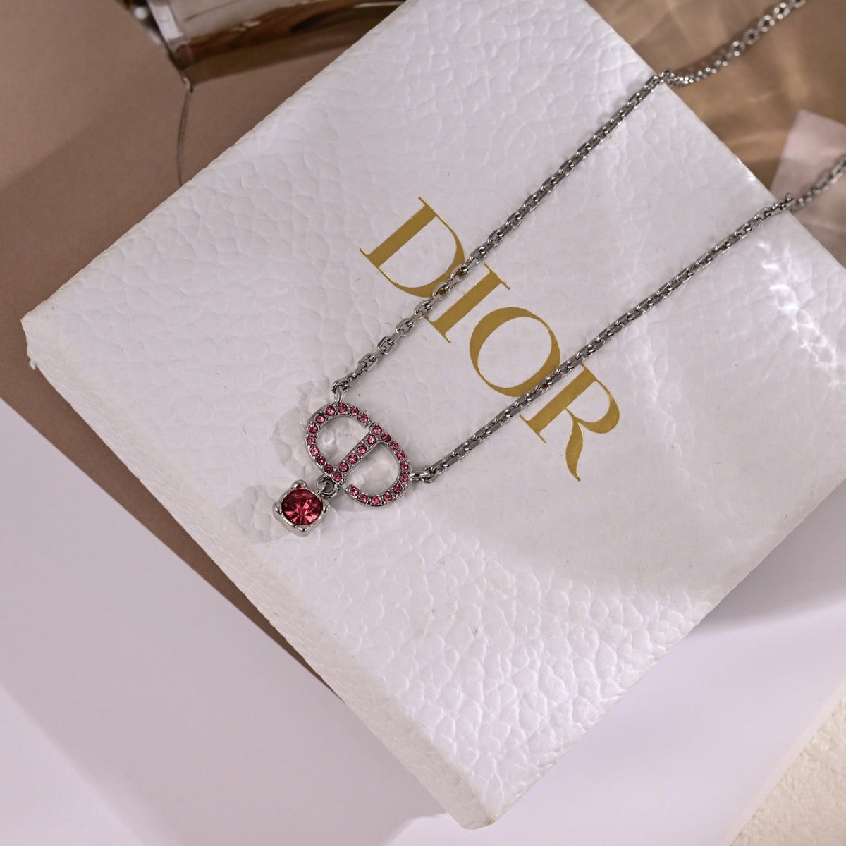 Martin Graham pendant necklace in polished metal-tone