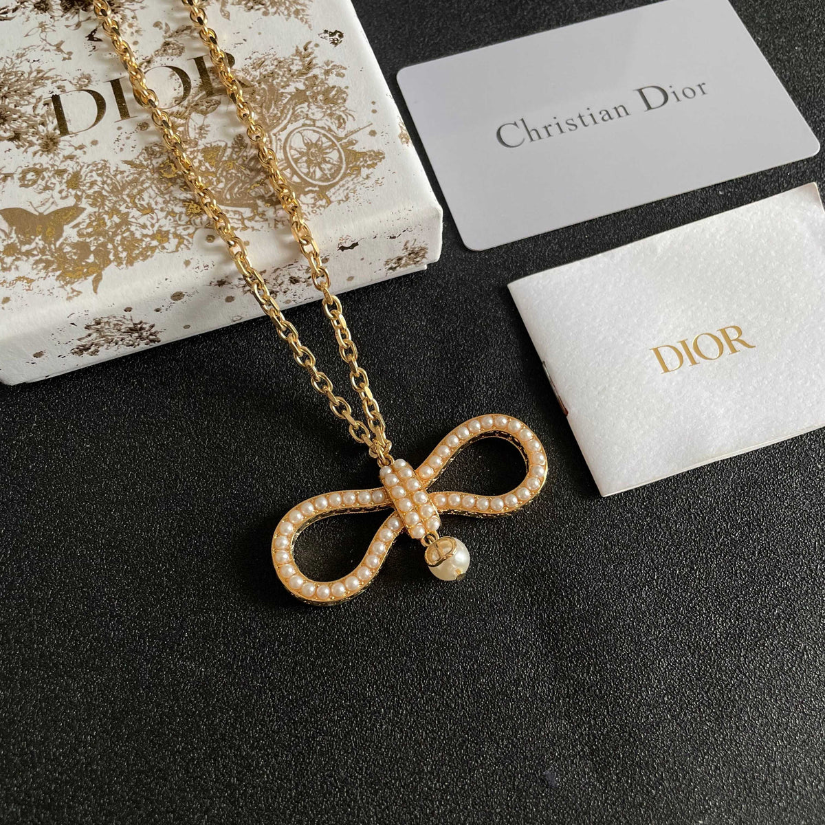 Martin Graham pendant necklace in polished metal-tone