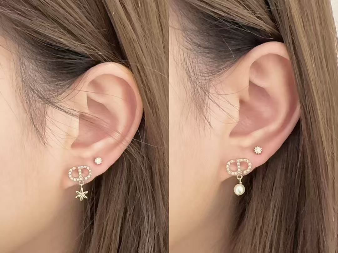 Martin Graham stud earrings in polished metal-tone