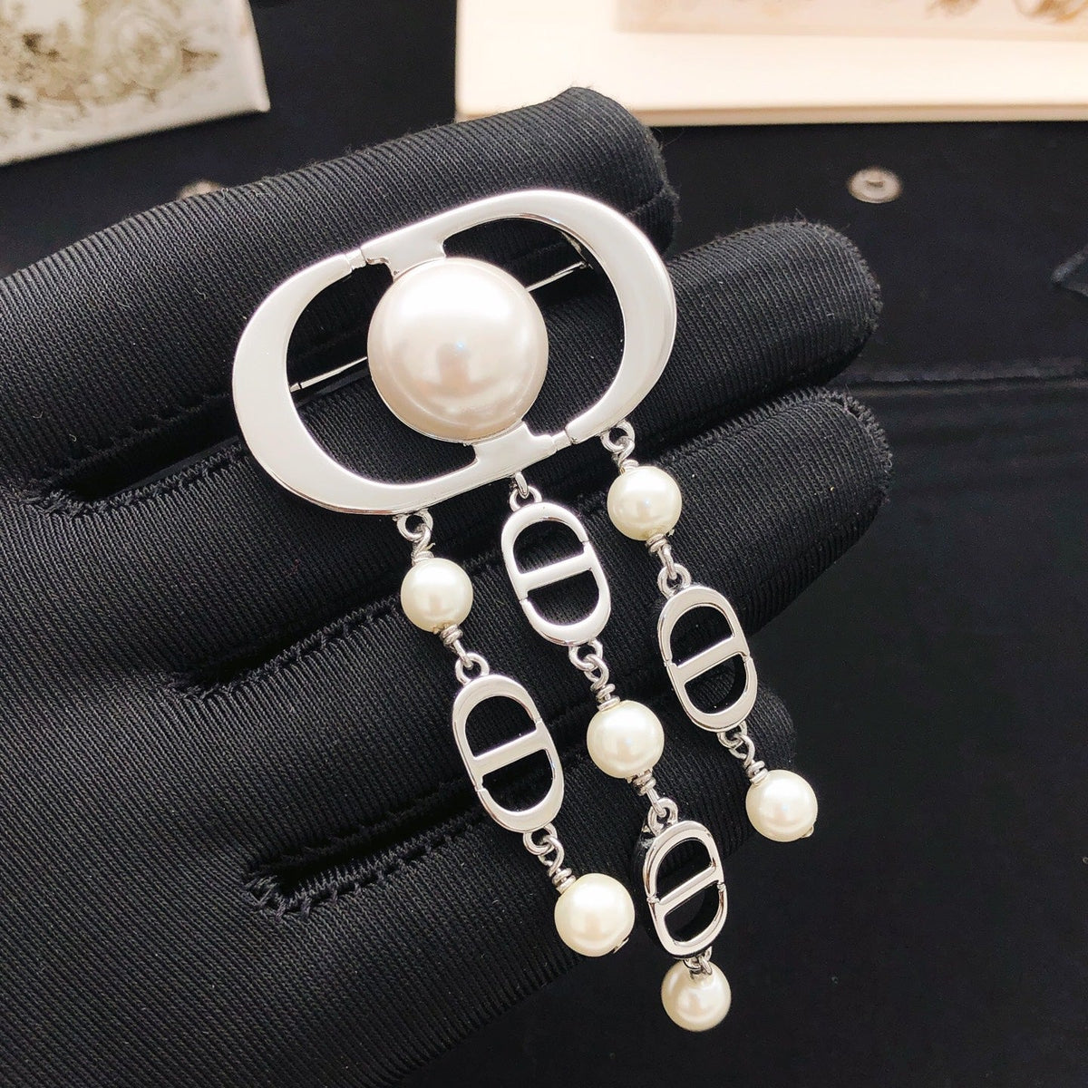 Martin Graham brooch in polished metal-tone
