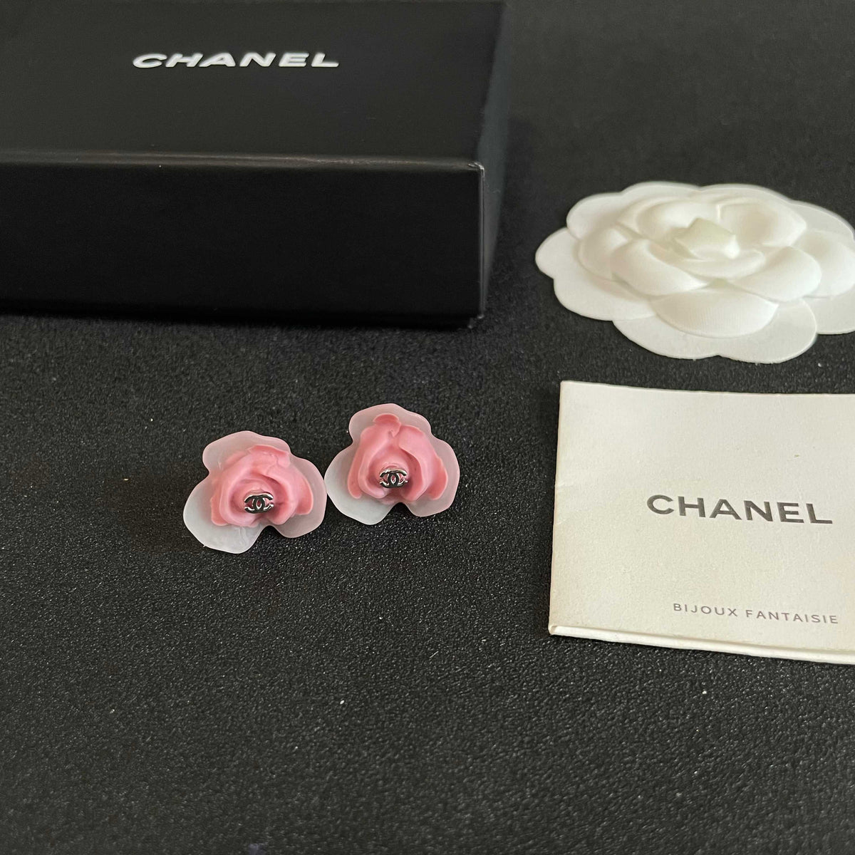 Martin Graham stud earrings in polished metal-tone – close-up detail