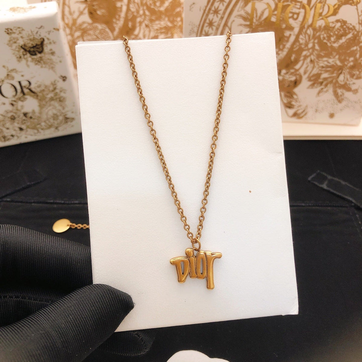 Martin Graham pendant necklace in polished metal-tone