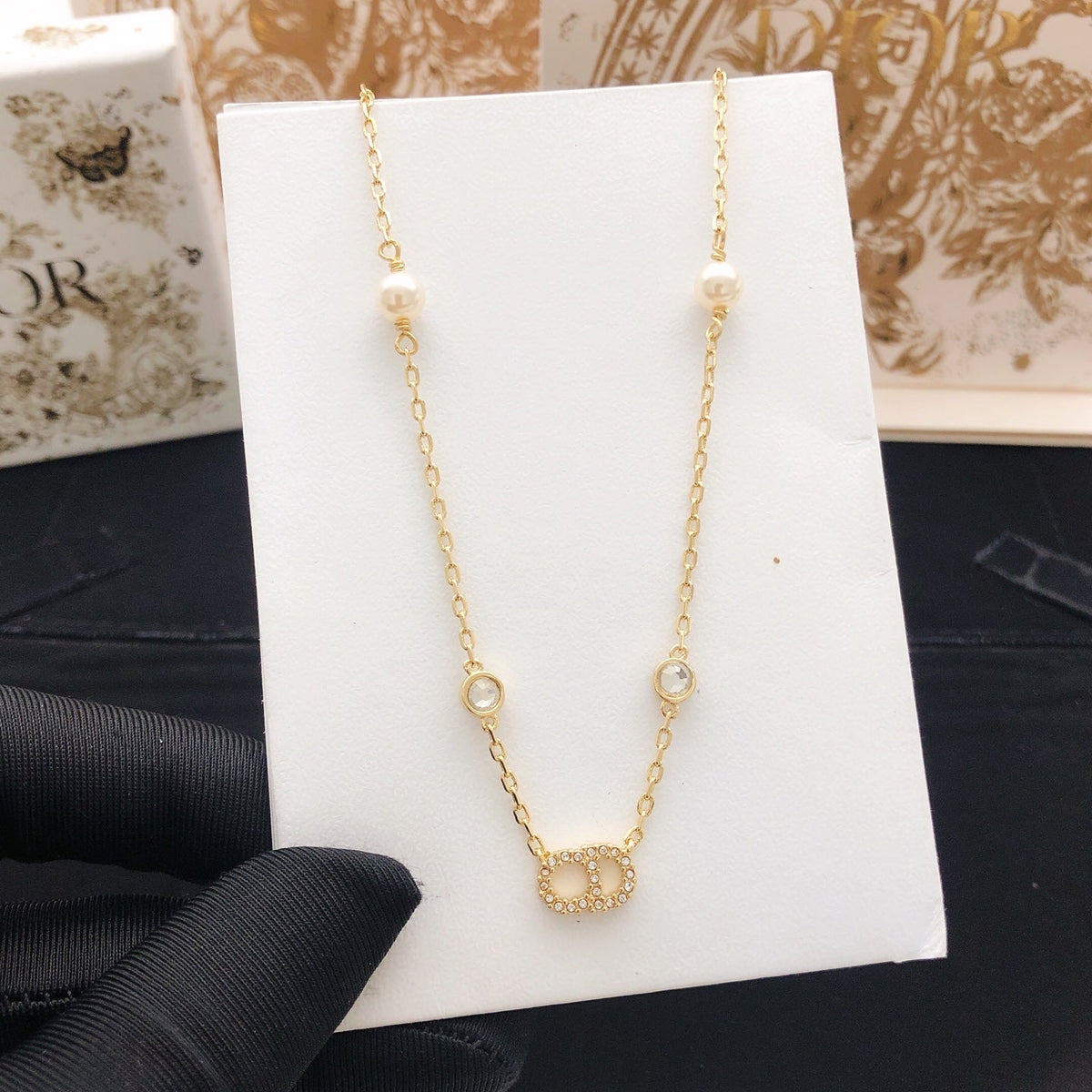 Martin Graham pendant necklace in polished metal-tone