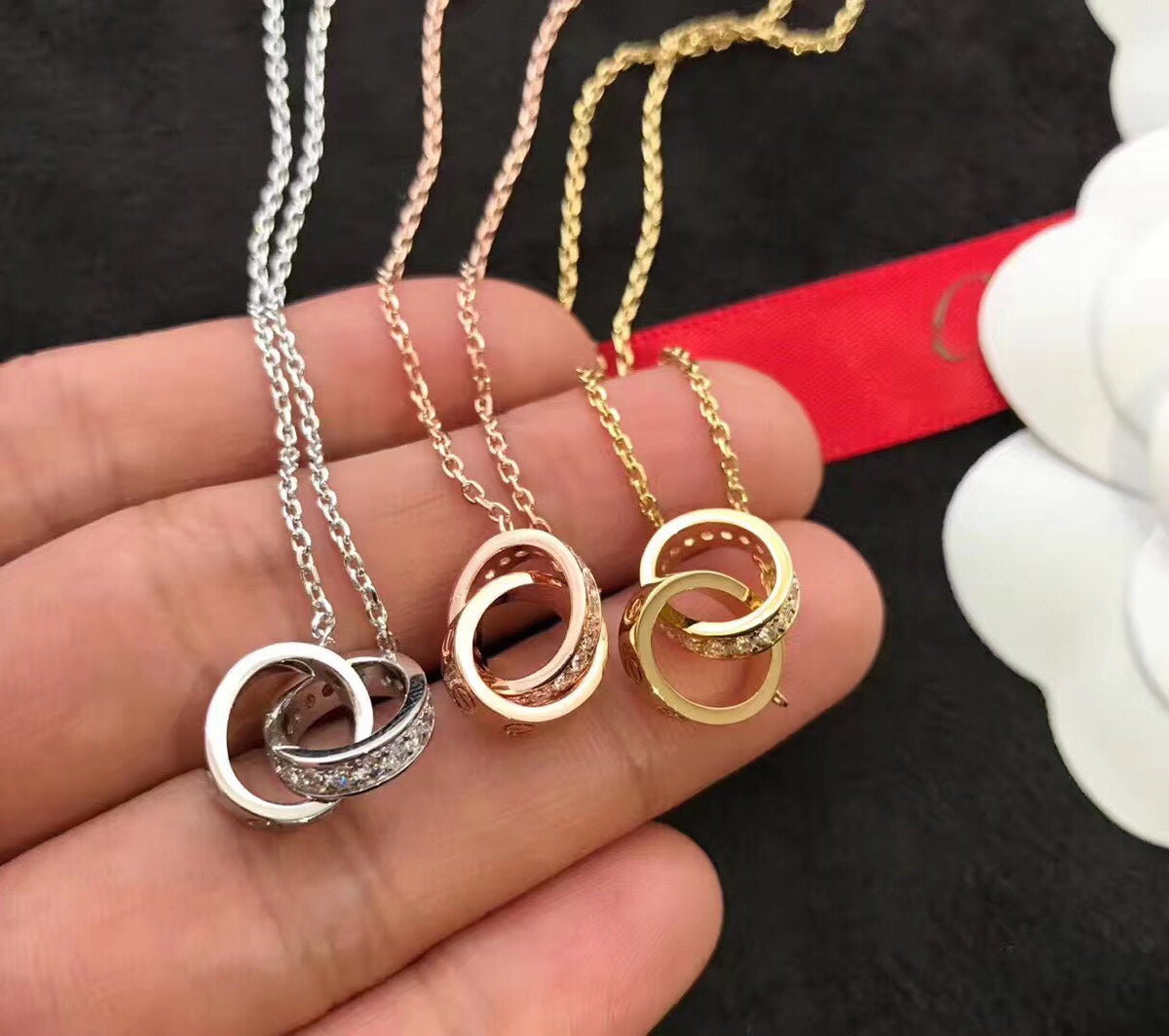 Martin Graham pendant necklace in polished metal-tone