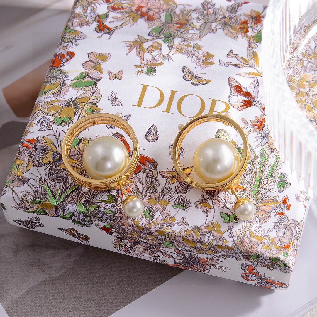 Martin Graham earrings in polished metal-tone