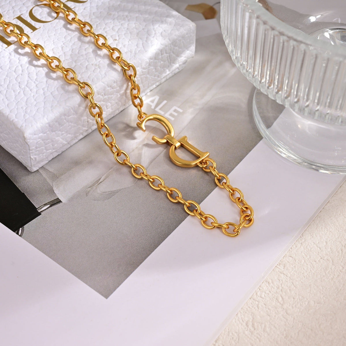 Martin Graham pendant necklace in polished metal-tone