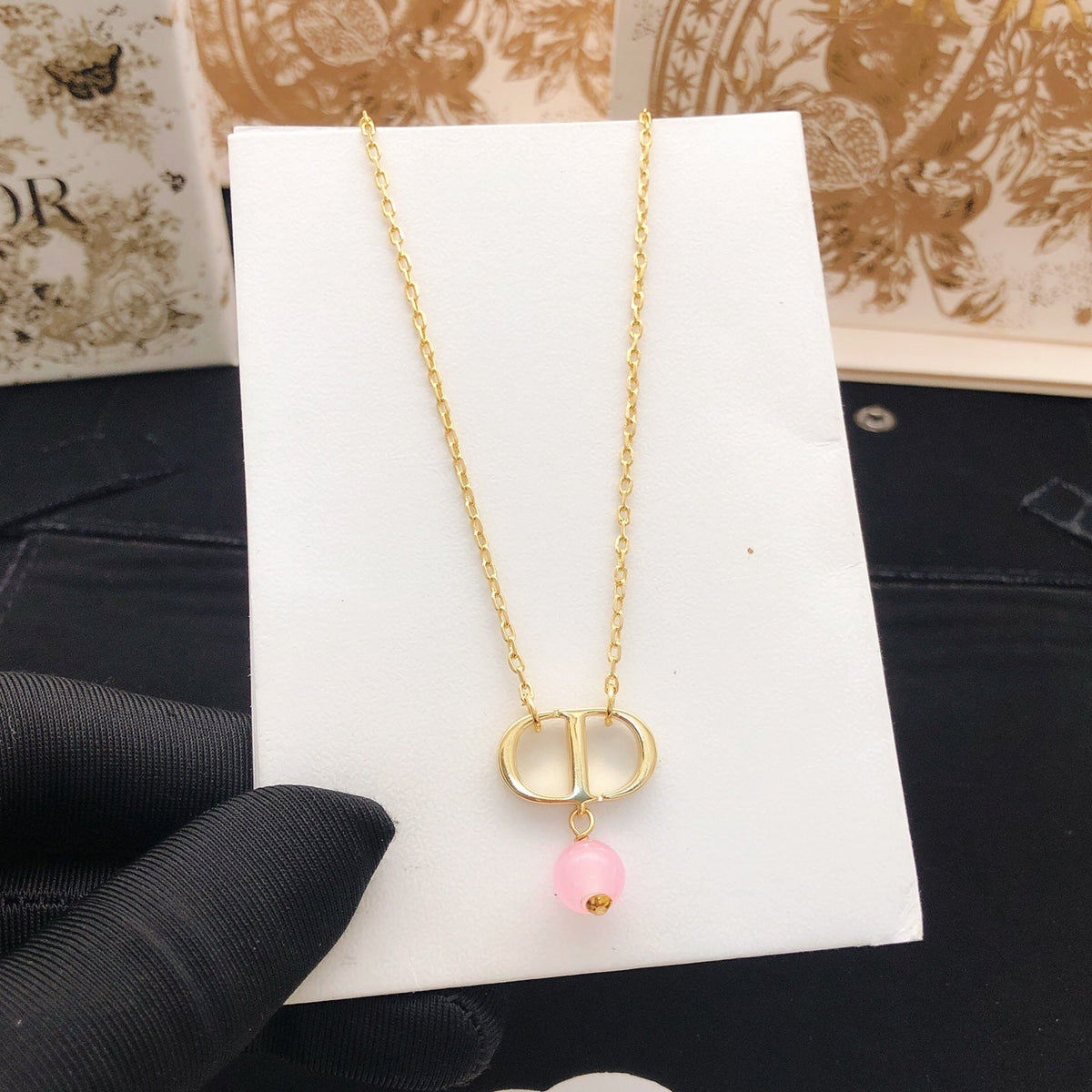 Martin Graham pendant necklace in polished metal-tone