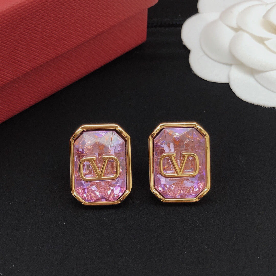 Martin Graham stud earrings in polished metal-tone