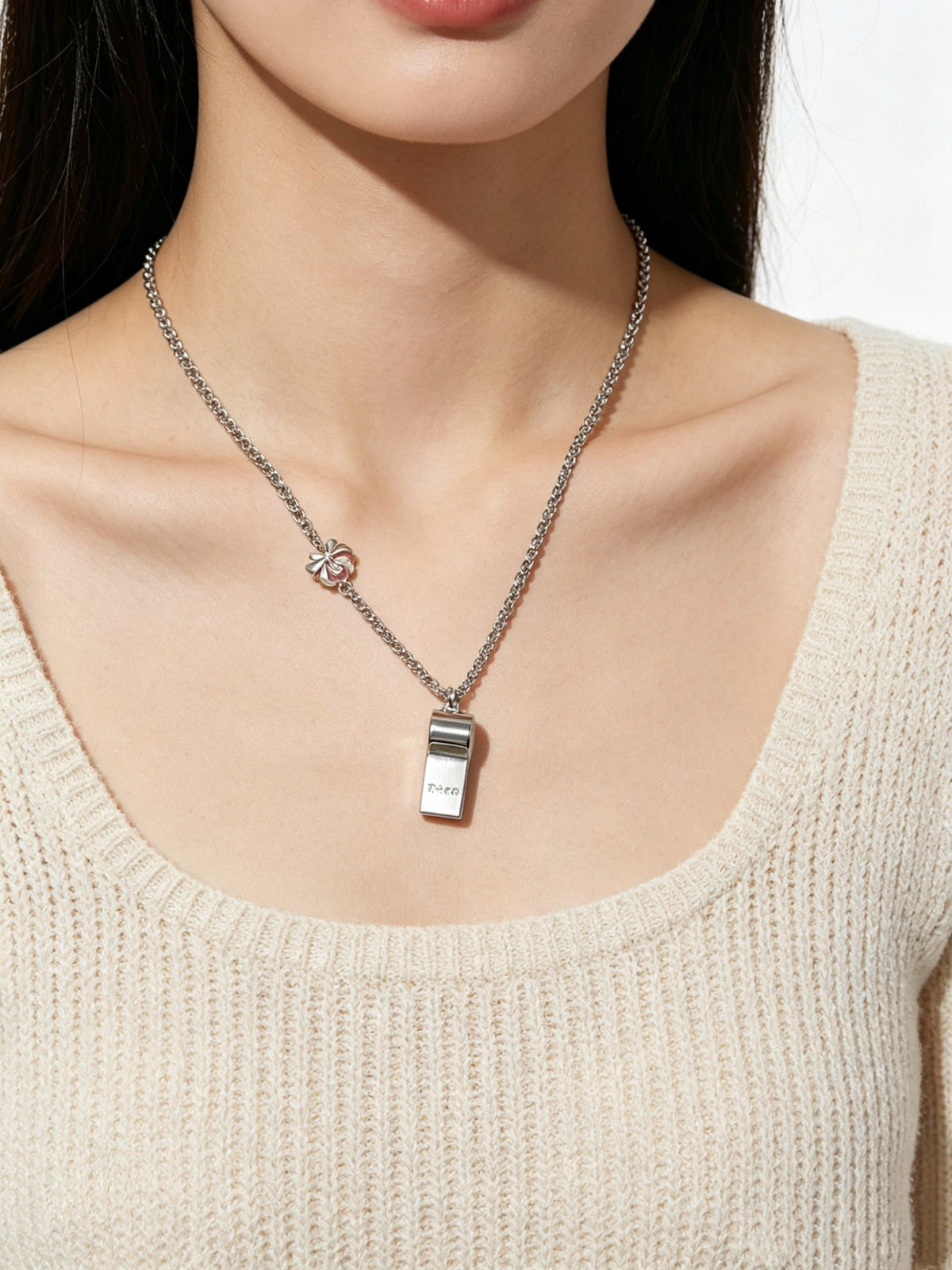 Martin Graham pendant necklace in polished metal-tone – close-up detail