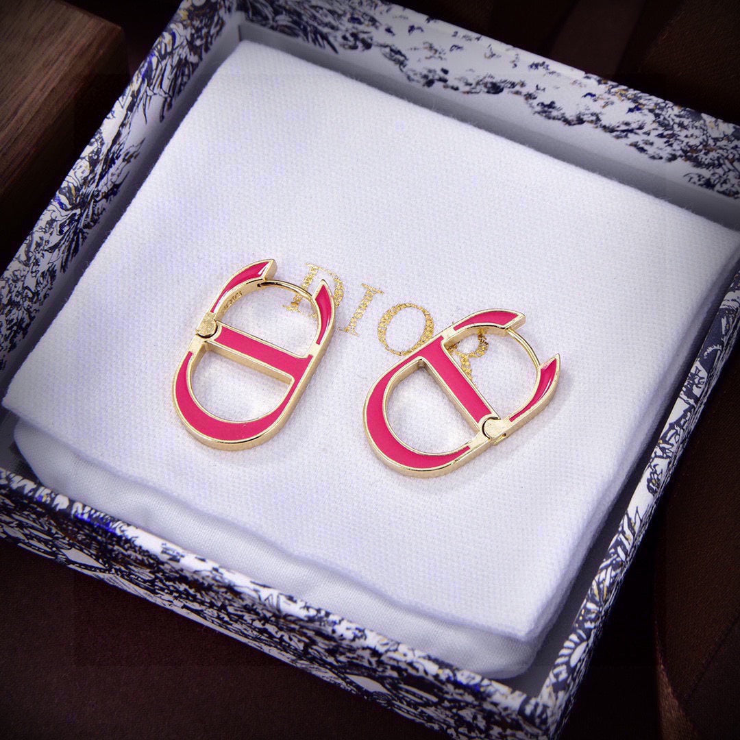 Martin Graham earrings in polished metal-tone