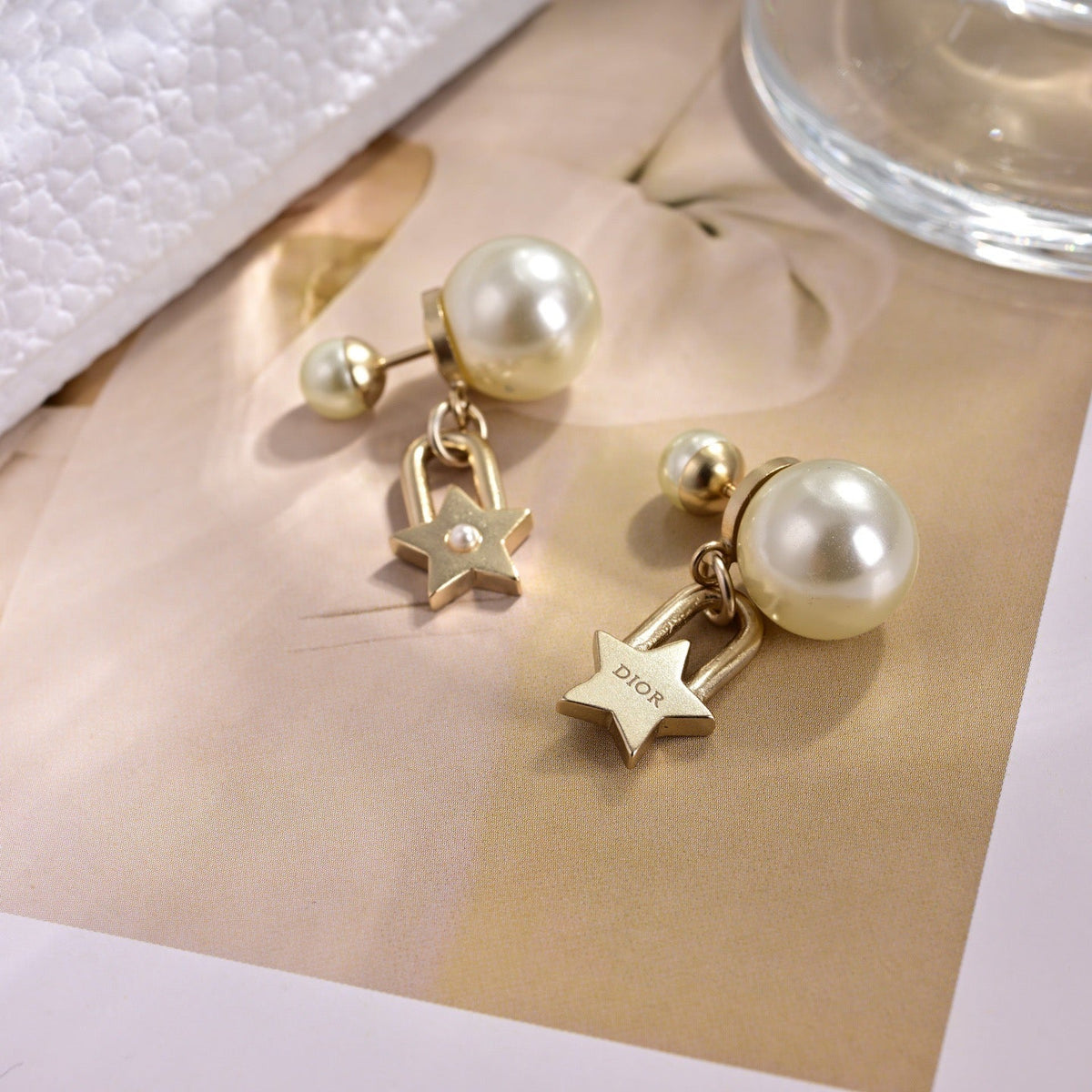 Martin Graham earrings in polished metal-tone