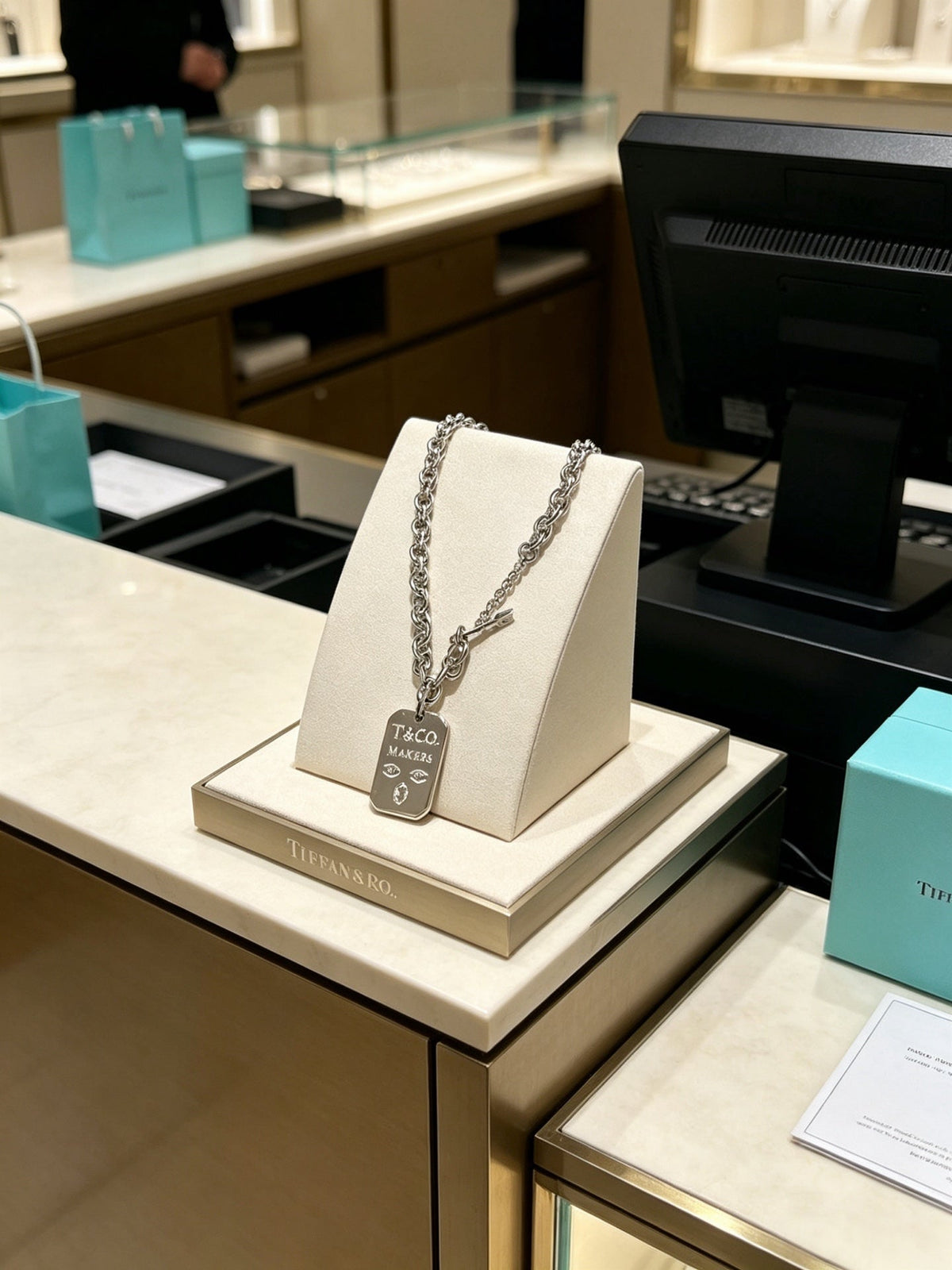 Martin Graham pendant necklace in polished metal-tone – close-up detail
