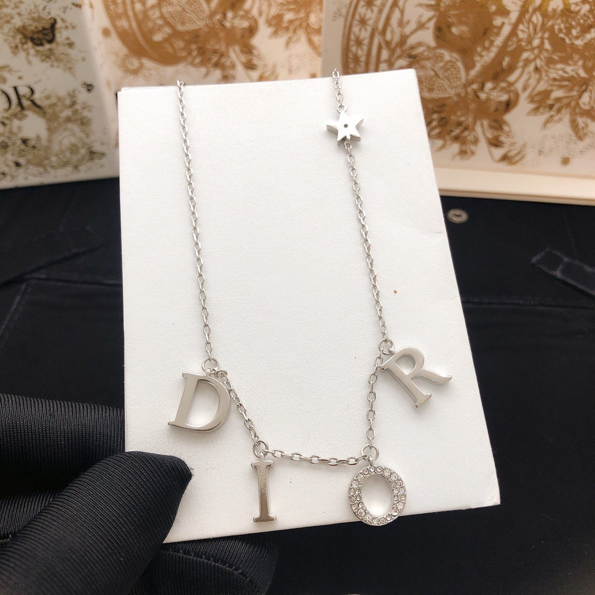 Martin Graham pendant necklace in polished metal-tone