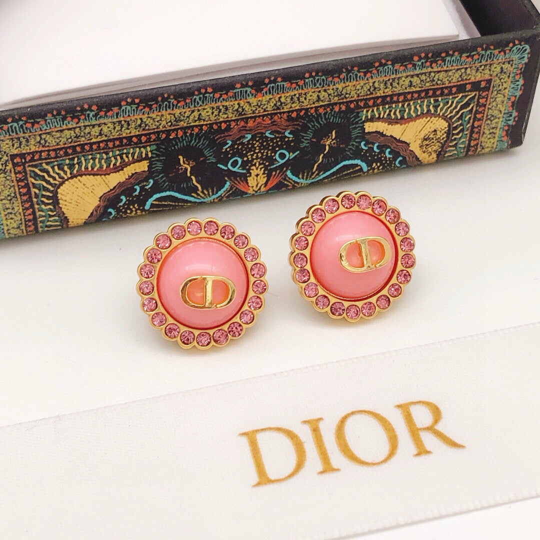 Martin Graham stud earrings in polished metal-tone