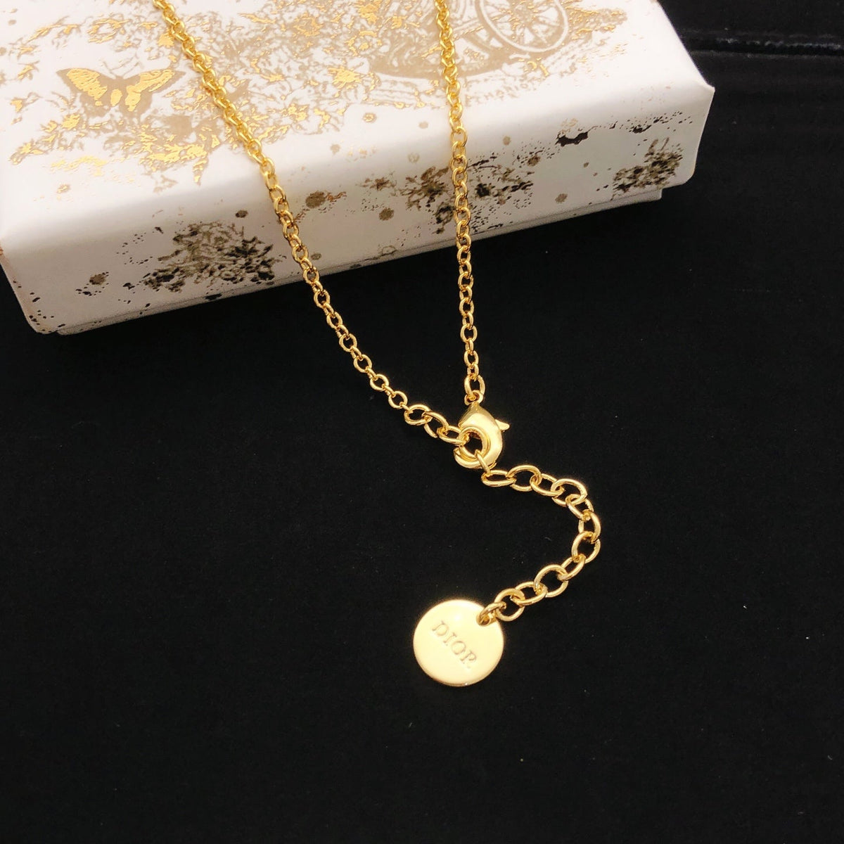Martin Graham pendant necklace in polished metal-tone