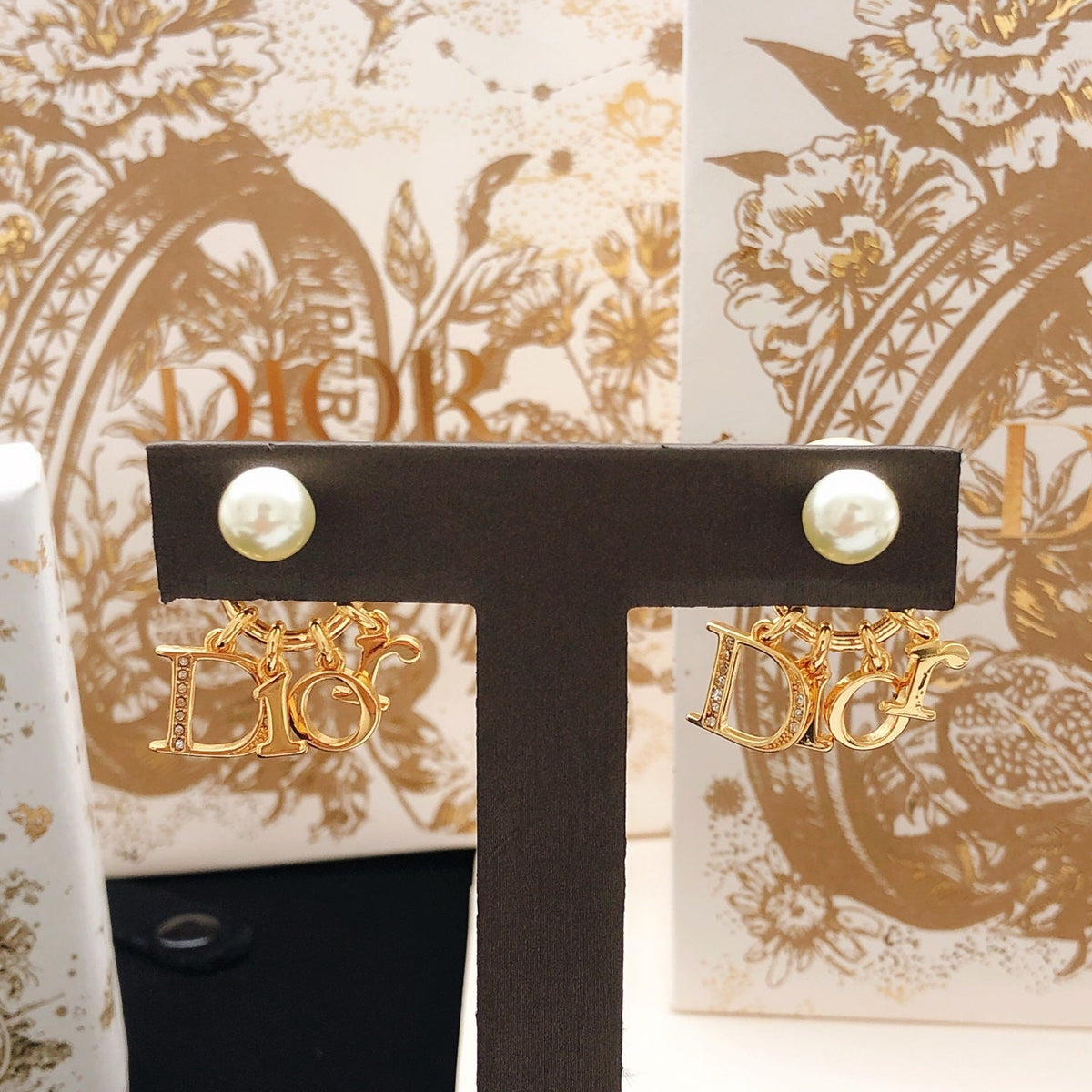 Martin Graham stud earrings in polished metal-tone