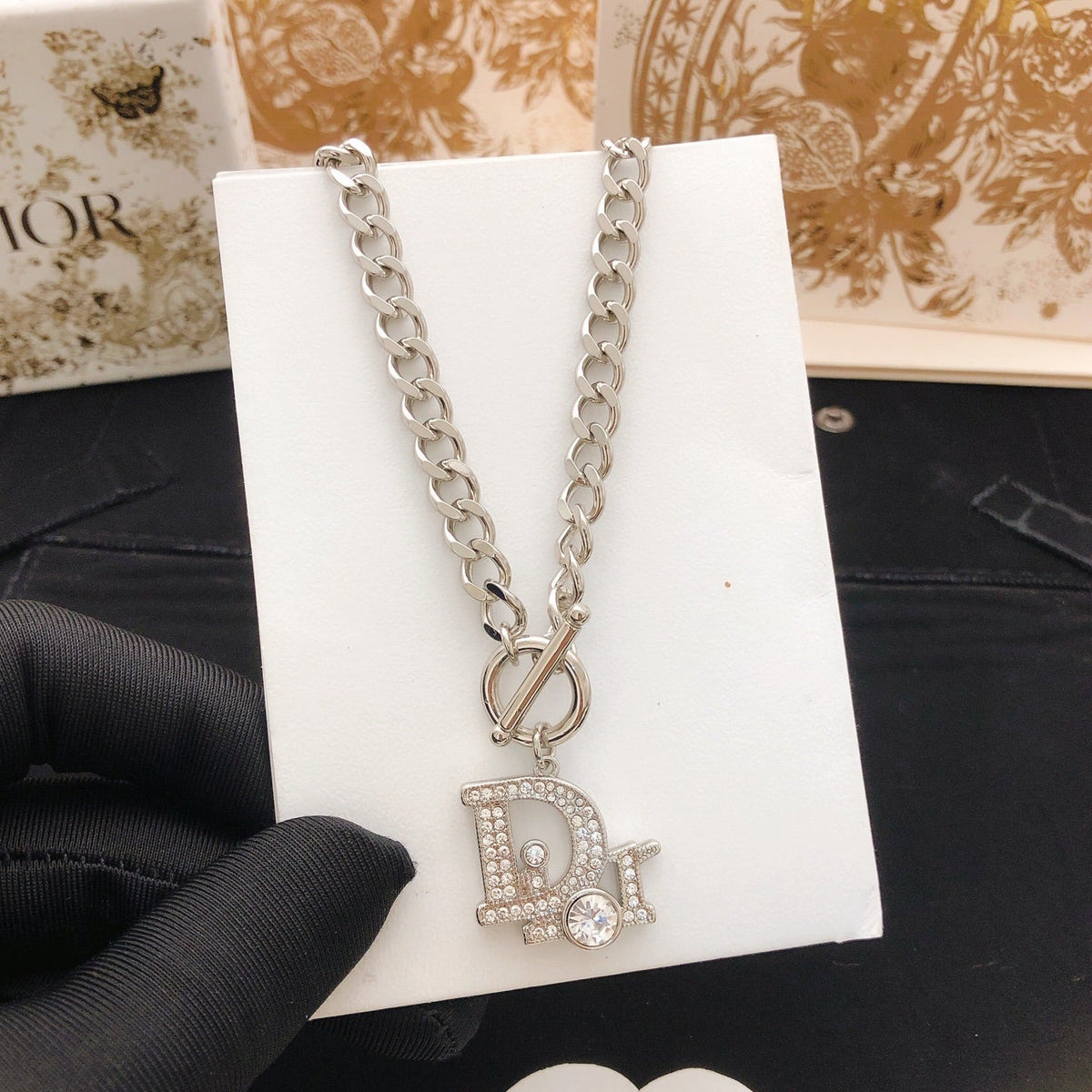 Martin Graham pendant necklace in polished metal-tone