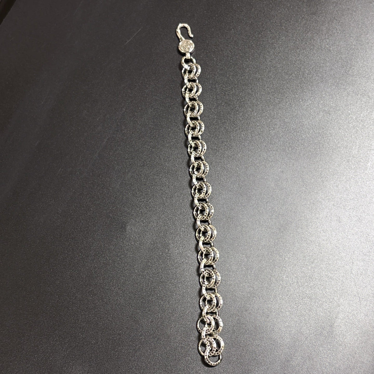 Martin Graham bracelet in polished metal-tone – close-up detail