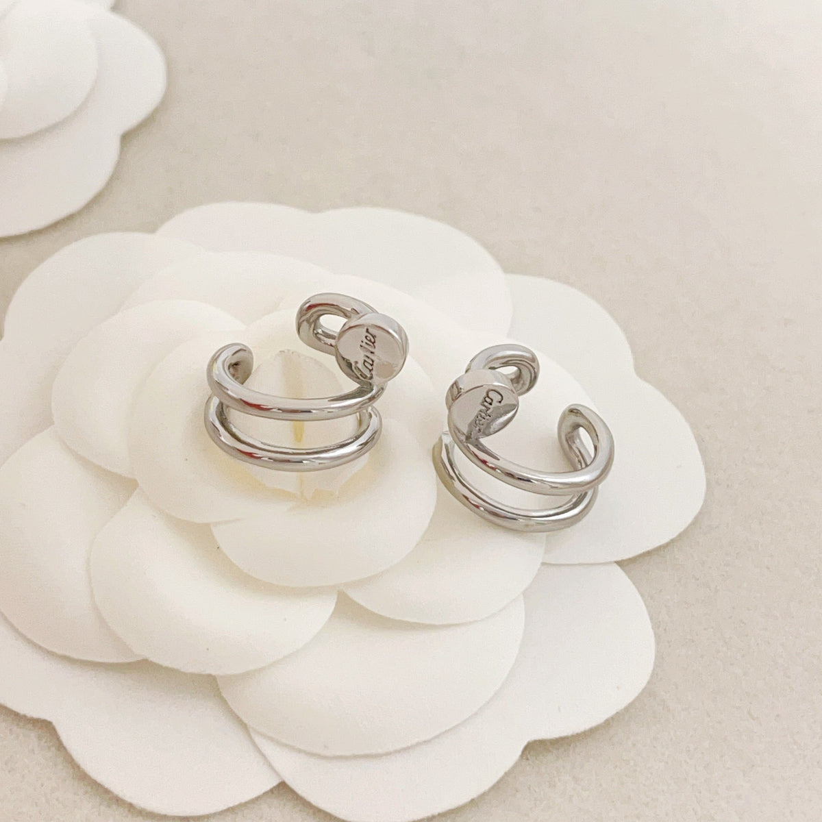 Martin Graham jewelry accessory in polished metal-tone