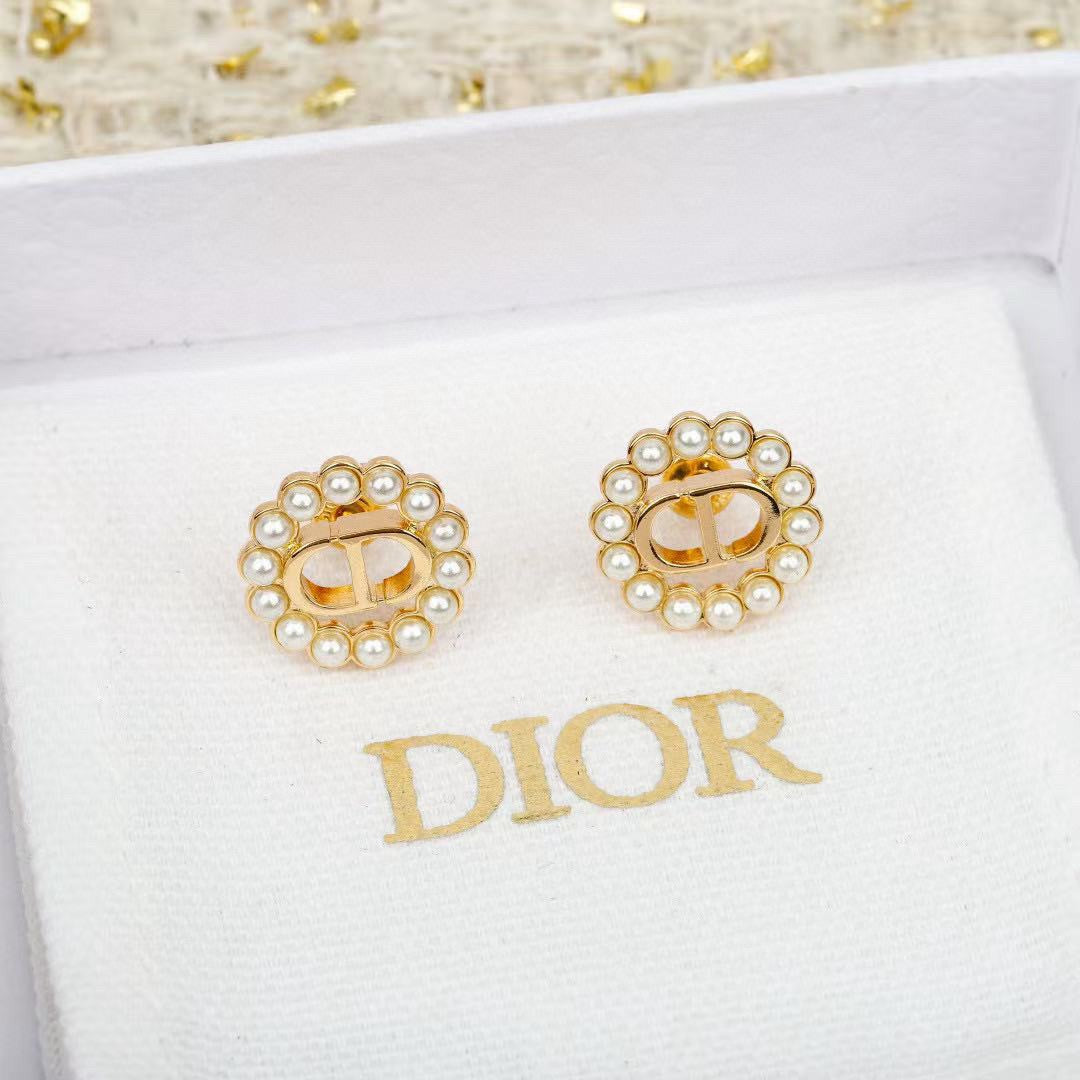 Martin Graham stud earrings in polished metal-tone
