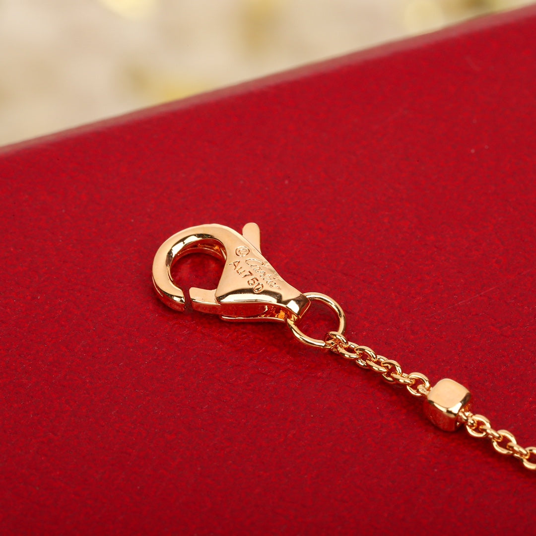 Martin Graham pendant necklace in polished metal-tone