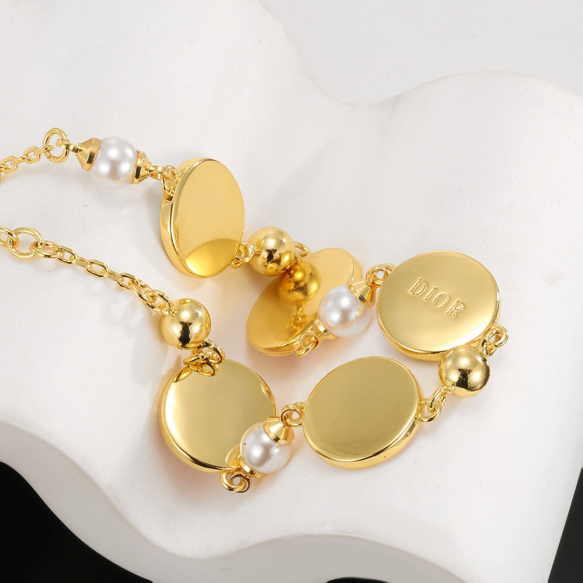 Martin Graham pendant necklace in polished metal-tone