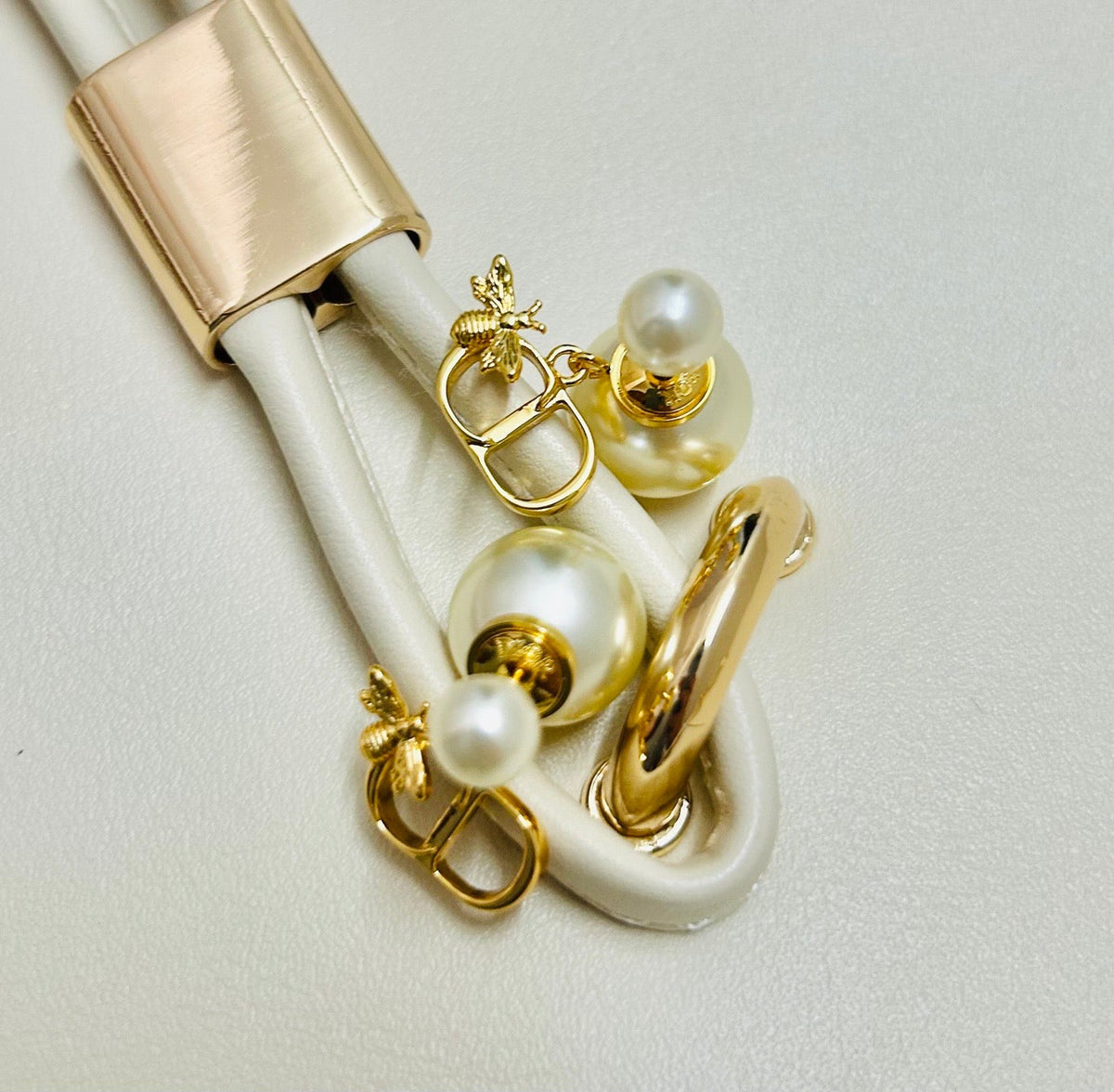 Martin Graham earrings in polished metal-tone