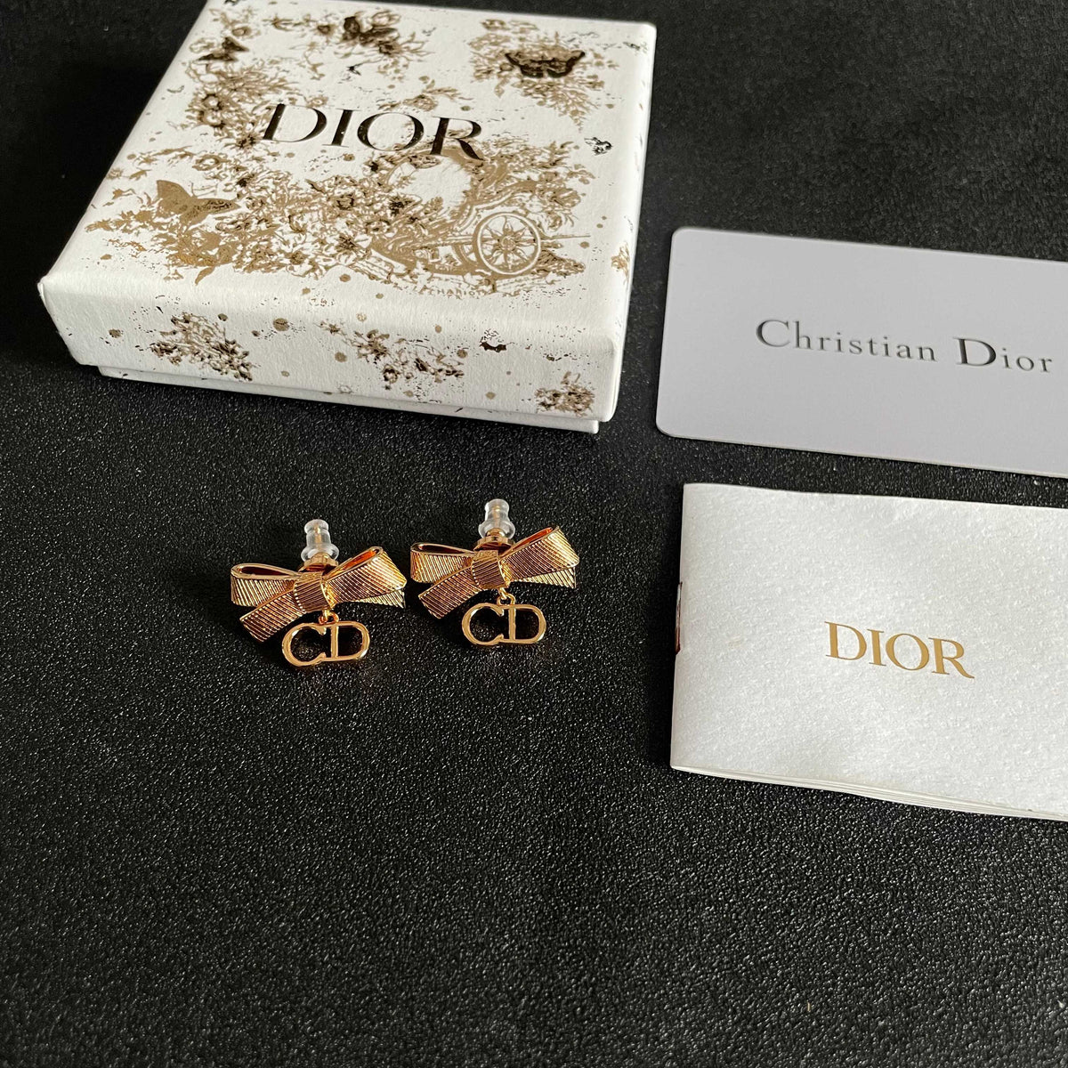 Martin Graham stud earrings in polished metal-tone