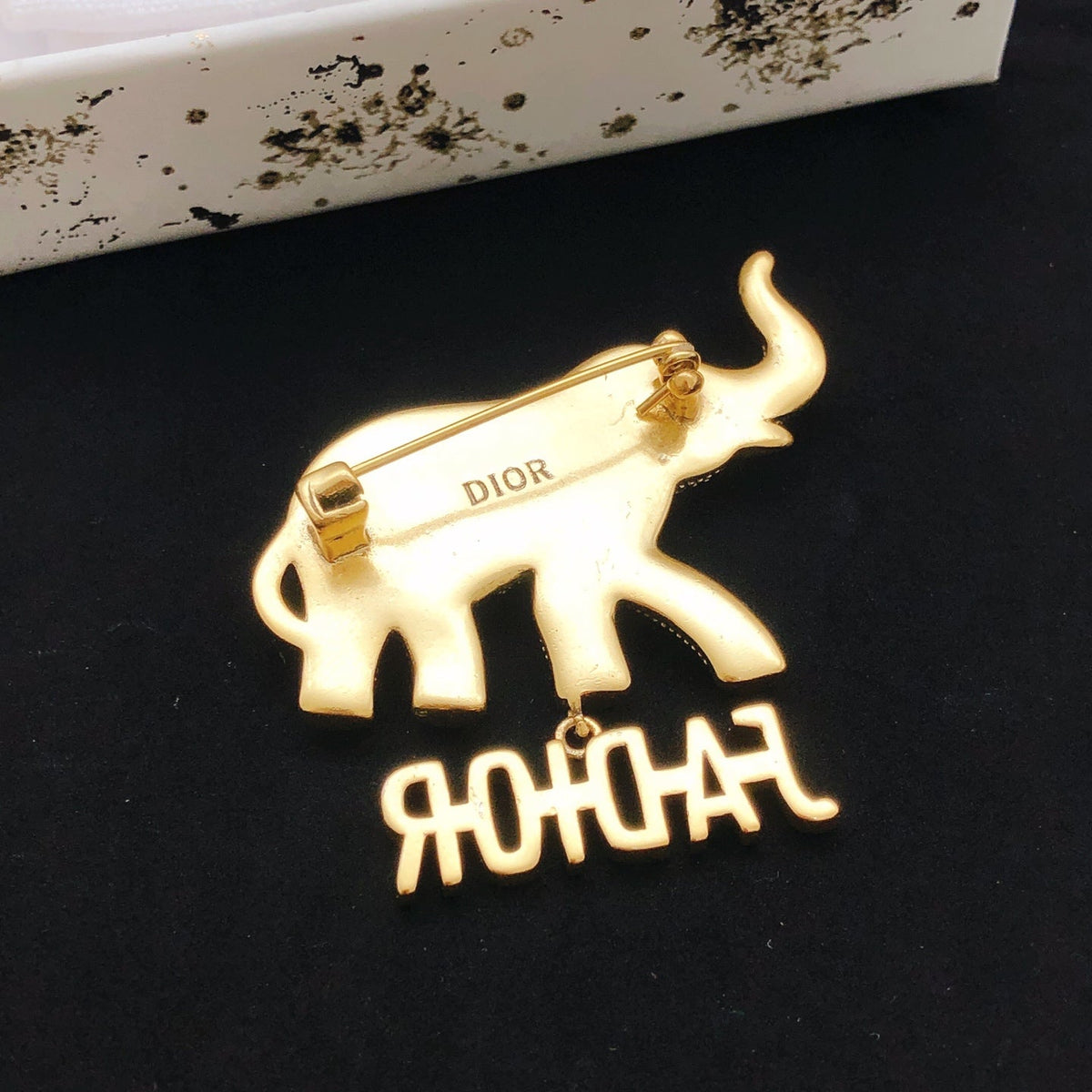 Martin Graham brooch in polished metal-tone