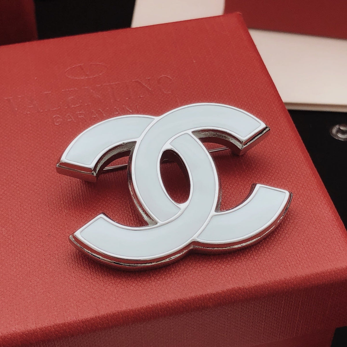 Martin Graham brooch in polished metal-tone