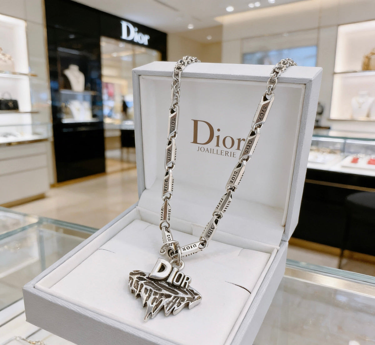 Martin Graham pendant necklace in polished metal-tone